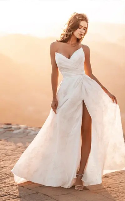 Model wearing a A-LINE gown