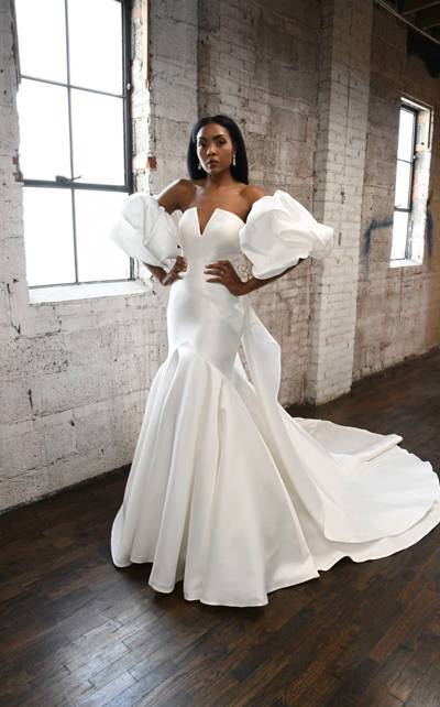 Model wearing a white bridal gown