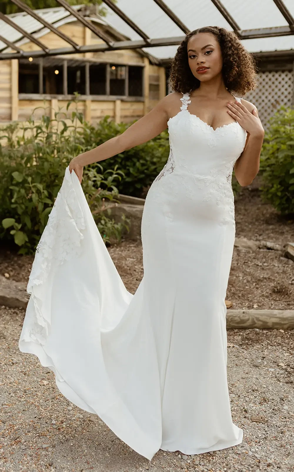 Model wearing a gown by Rebecca Ingram