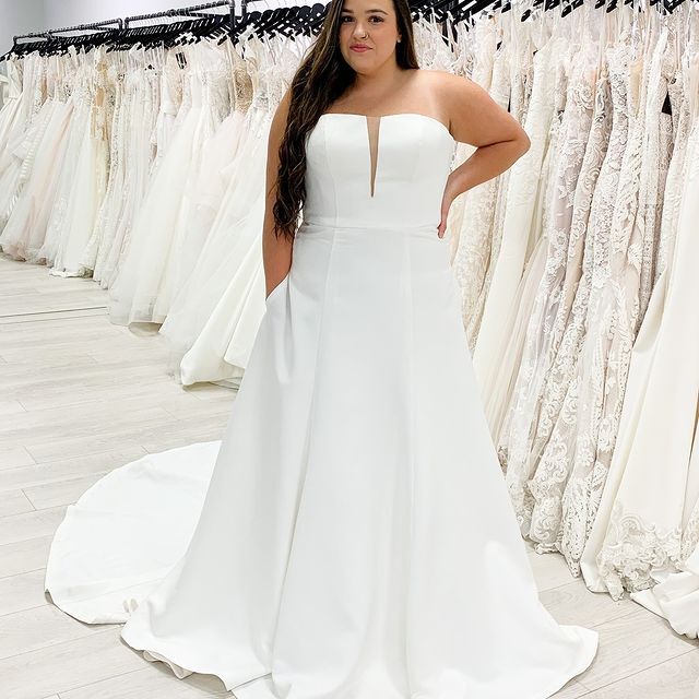 Model wearing a white gown